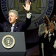 Then-President Bill Clinton receives applause during his address in July 2000 at the 91st convention of the NAACP in Baltimore. Looking on at right is then-NAACP Chairman Julian Bond.
TIM SLOAN/AFP/Getty Images